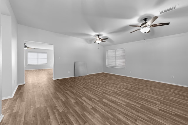 unfurnished living room with hardwood / wood-style floors