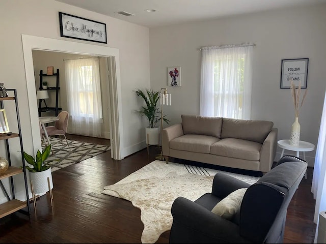 living room with dark wood-type flooring