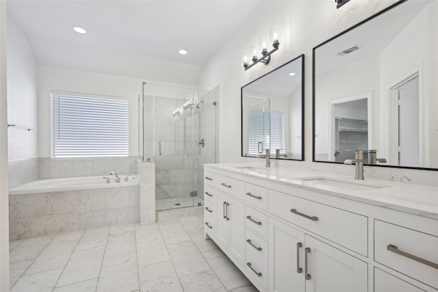 bathroom featuring vanity and plus walk in shower