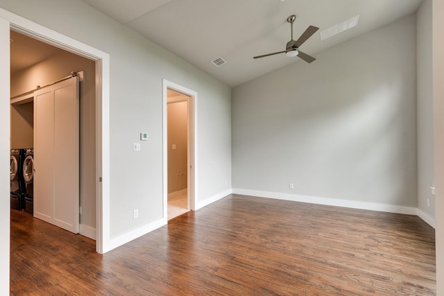 unfurnished room featuring dark hardwood / wood-style floors, ceiling fan, and lofted ceiling