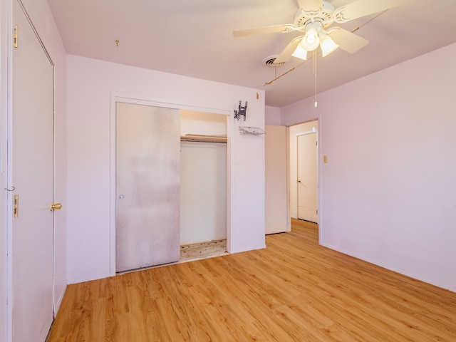 unfurnished bedroom featuring ceiling fan and light hardwood / wood-style floors