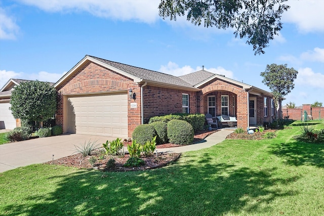 ranch-style home with a garage and a front yard