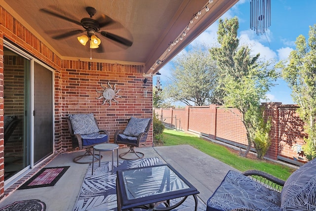 view of patio with ceiling fan