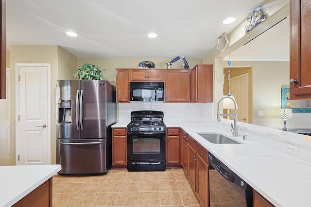 kitchen featuring backsplash, crown molding, sink, black appliances, and light tile patterned floors