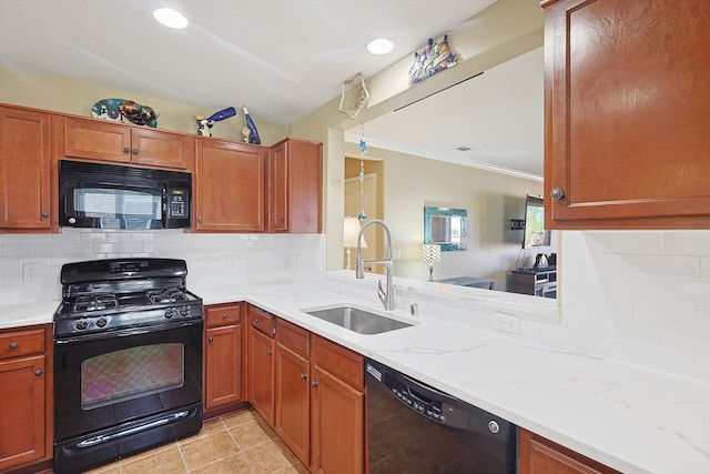 kitchen with sink, backsplash, light tile patterned floors, black appliances, and ornamental molding