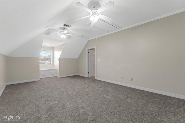 additional living space with carpet floors, ceiling fan, and lofted ceiling