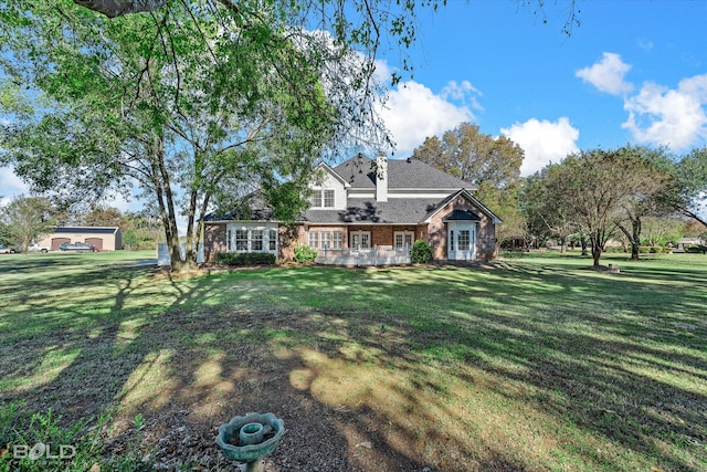 view of front of home featuring a front yard