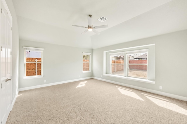 spare room with visible vents, baseboards, carpet, and ceiling fan