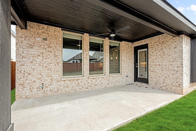 view of patio featuring a ceiling fan