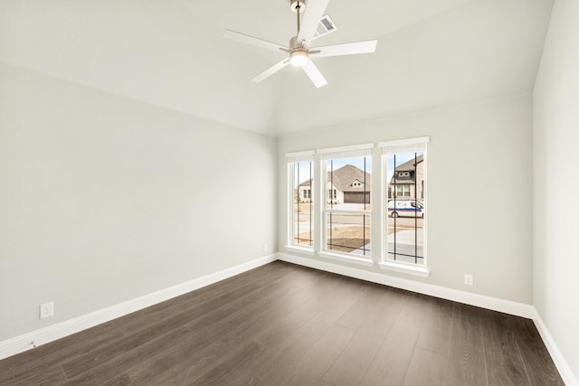 empty room with visible vents, baseboards, dark wood-type flooring, and ceiling fan