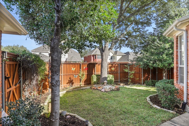 rear view of property with a lawn and a patio