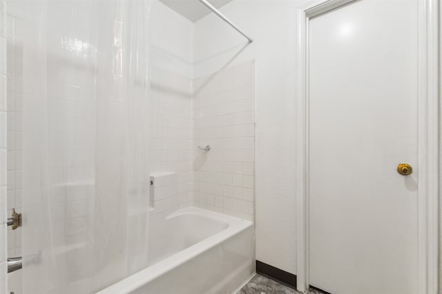 bathroom with shower / tub combo