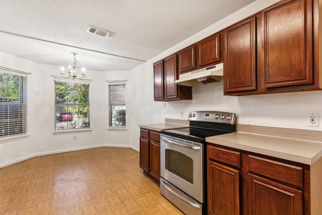 kitchen with stainless steel range with electric cooktop, a chandelier, hanging light fixtures, a textured ceiling, and light parquet floors