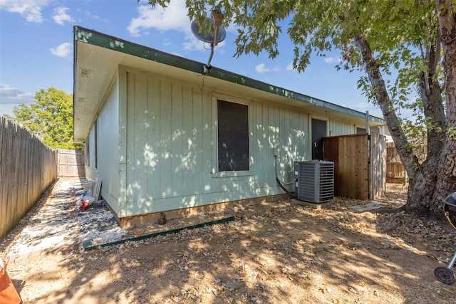 view of home's exterior with central AC unit