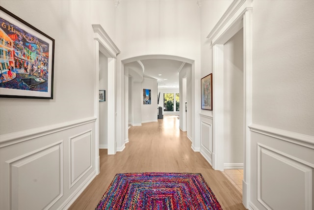 hall with light hardwood / wood-style flooring