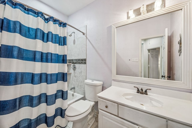 full bathroom with shower / bath combo with shower curtain, toilet, and vanity