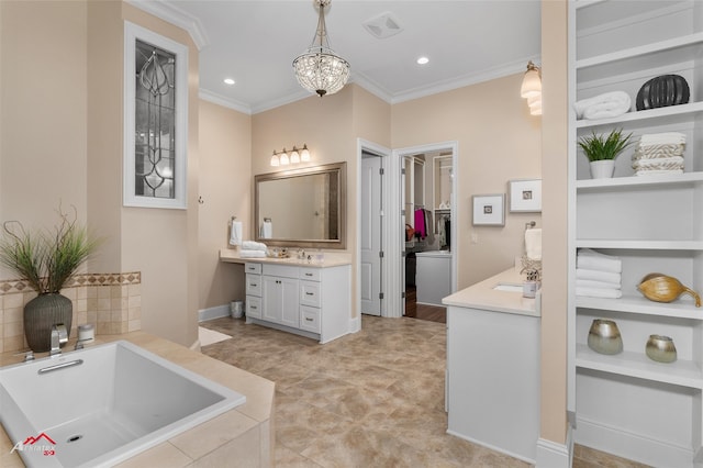 bathroom featuring a notable chandelier, vanity, crown molding, and tiled tub