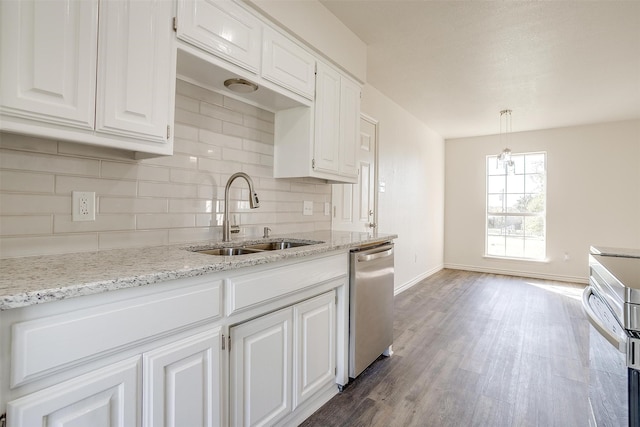 kitchen with white cabinets, appliances with stainless steel finishes, and sink