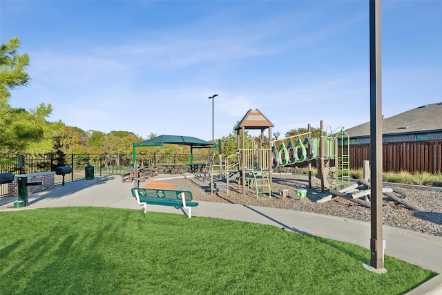 view of playground featuring a yard