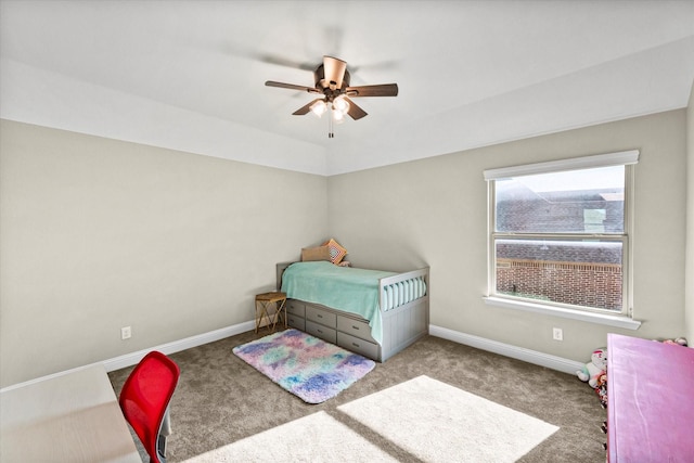 bedroom with ceiling fan and light colored carpet