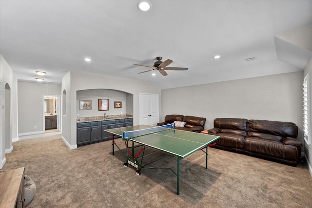 game room featuring ceiling fan and light carpet