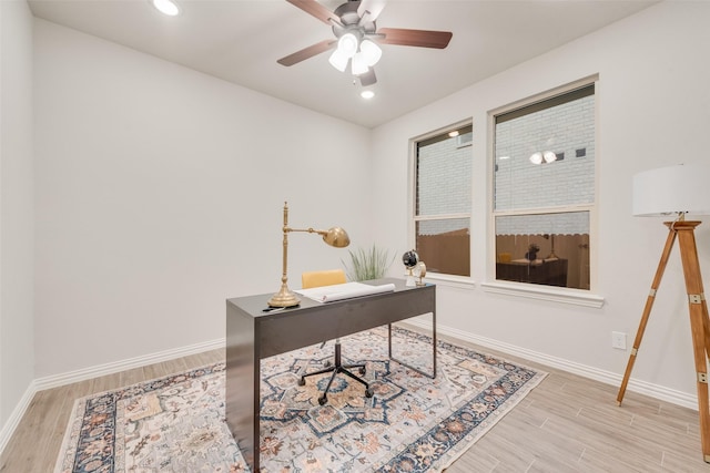 office area with recessed lighting, wood finished floors, baseboards, and ceiling fan