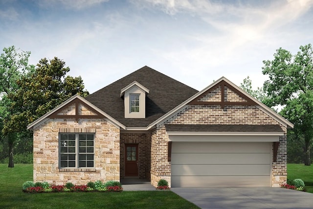 view of front of house with a garage and a front yard