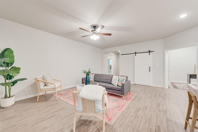 carpeted empty room featuring a tray ceiling and ceiling fan