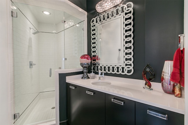 bathroom with vanity and walk in shower