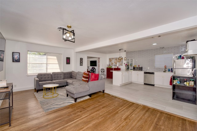 living room with light hardwood / wood-style floors