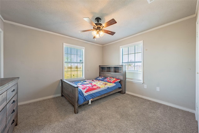 carpeted bedroom with ceiling fan, crown molding, a textured ceiling, and multiple windows