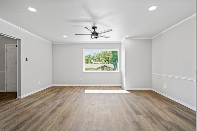 spare room with ceiling fan, wood-type flooring, and ornamental molding