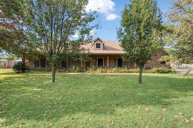 view of front of home with a front yard