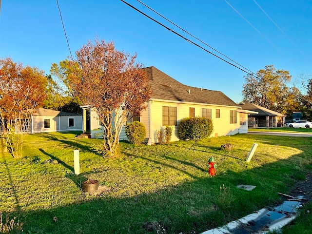 exterior space featuring a lawn