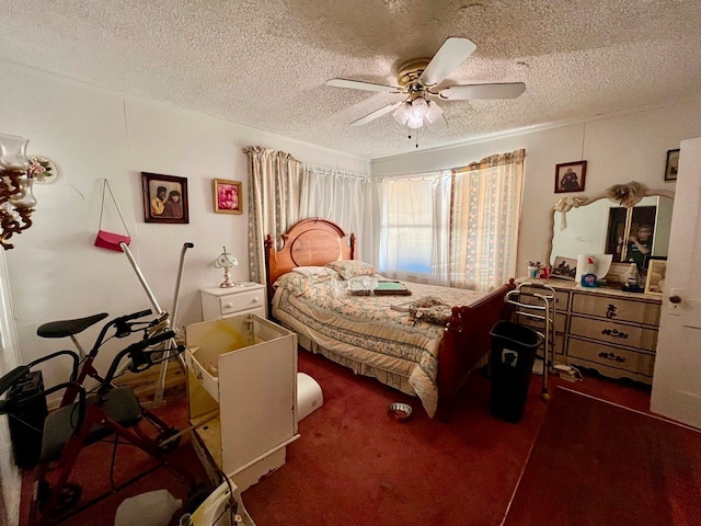 carpeted bedroom featuring ceiling fan and a textured ceiling