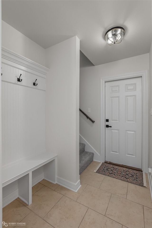 mudroom with light tile patterned floors