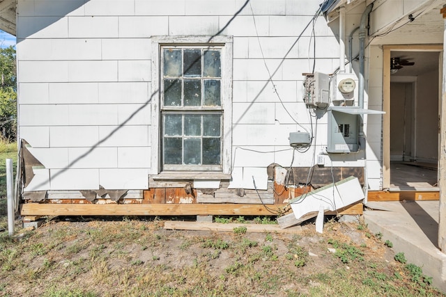 view of home's exterior with electric panel