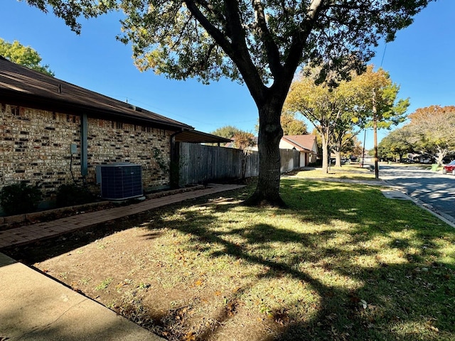 view of yard featuring central AC unit