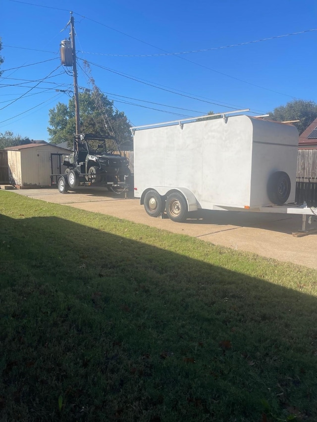 view of yard with a shed