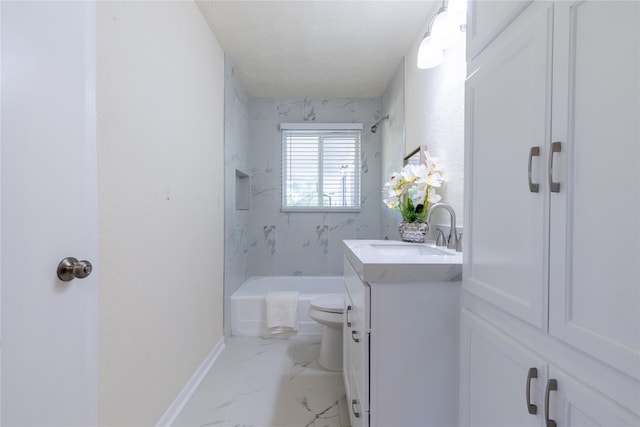 full bathroom featuring vanity, tiled shower / bath combo, and toilet