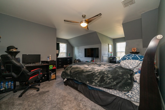 bedroom featuring carpet, ceiling fan, and vaulted ceiling