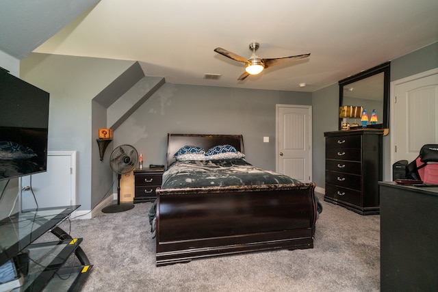 bedroom featuring ceiling fan and light carpet