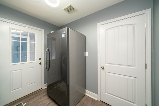 bathroom with hardwood / wood-style flooring