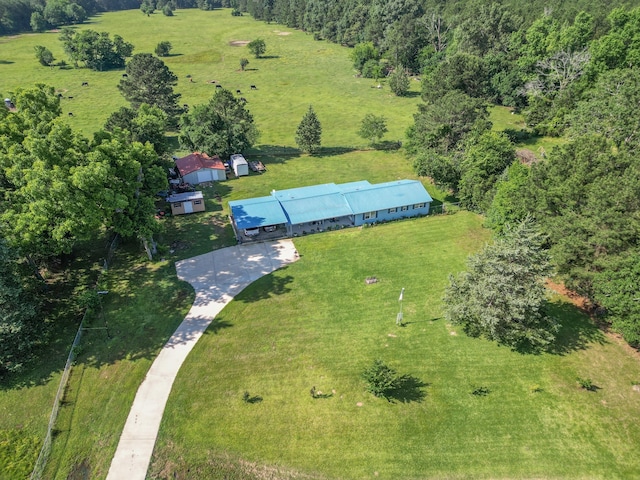 birds eye view of property featuring a rural view