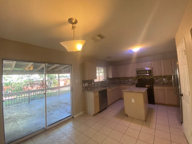 kitchen with stainless steel appliances, light tile patterned floors, tasteful backsplash, pendant lighting, and a kitchen island