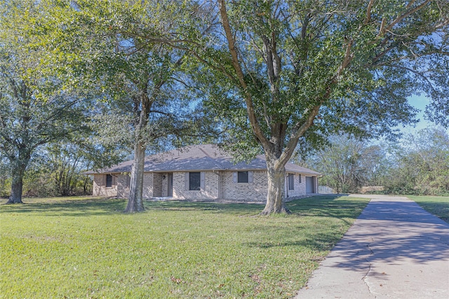 view of front of property with a front lawn