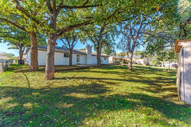 ranch-style house with a front lawn