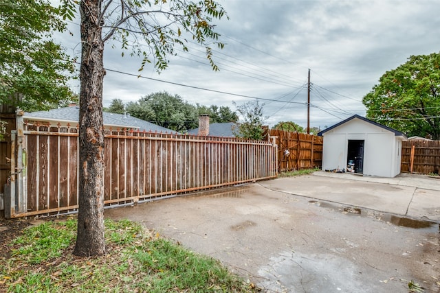 view of patio / terrace featuring a shed