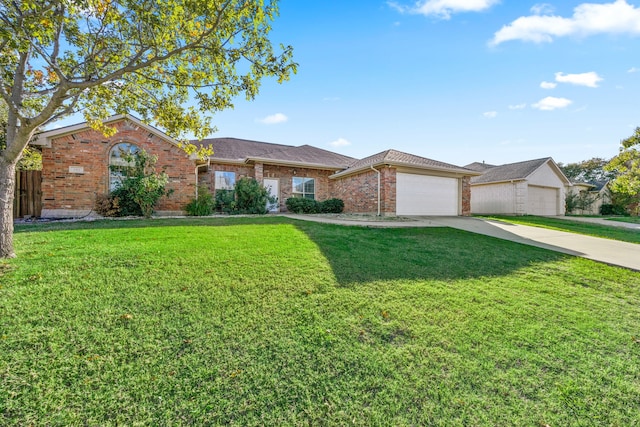 ranch-style house with a garage and a front lawn