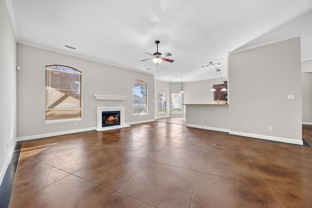 unfurnished living room with ceiling fan and ornamental molding